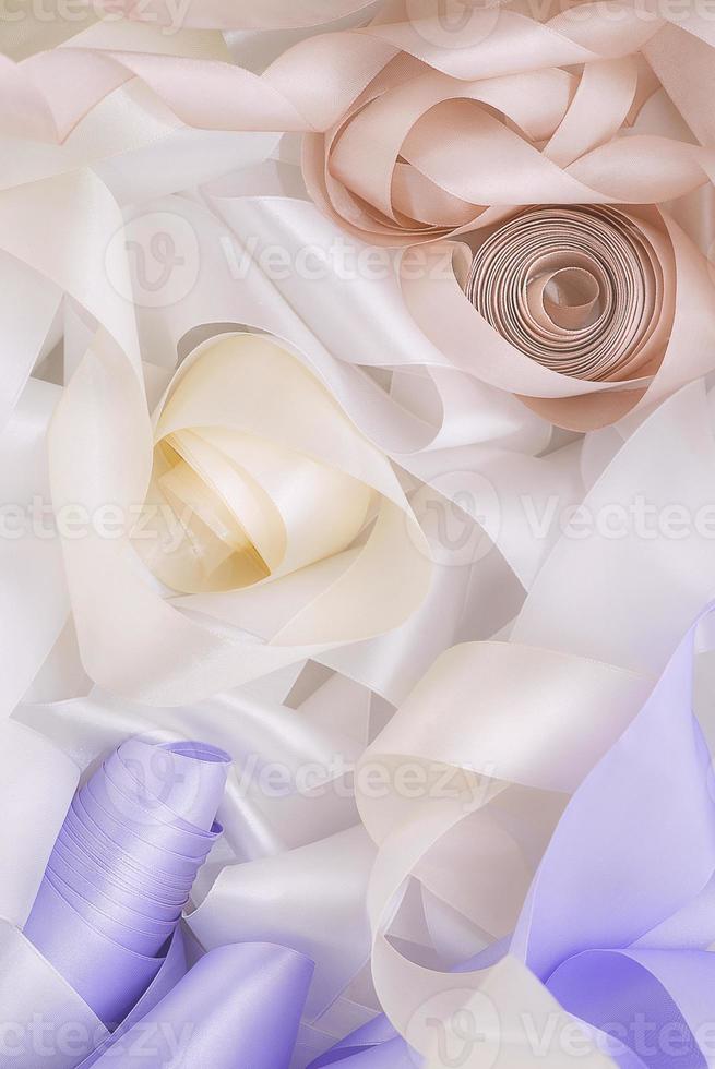 white and beige ribbon in sewing shop photo