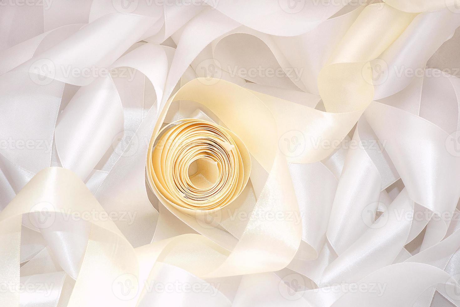 white and beige ribbon in sewing shop photo