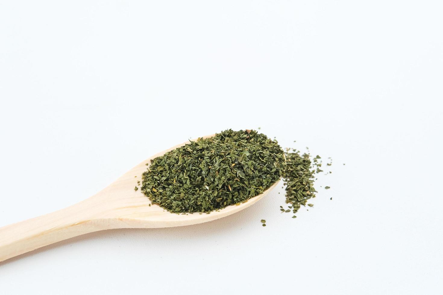 Dried herbs rosemary leaf on white background, copy space and selective focus image. photo