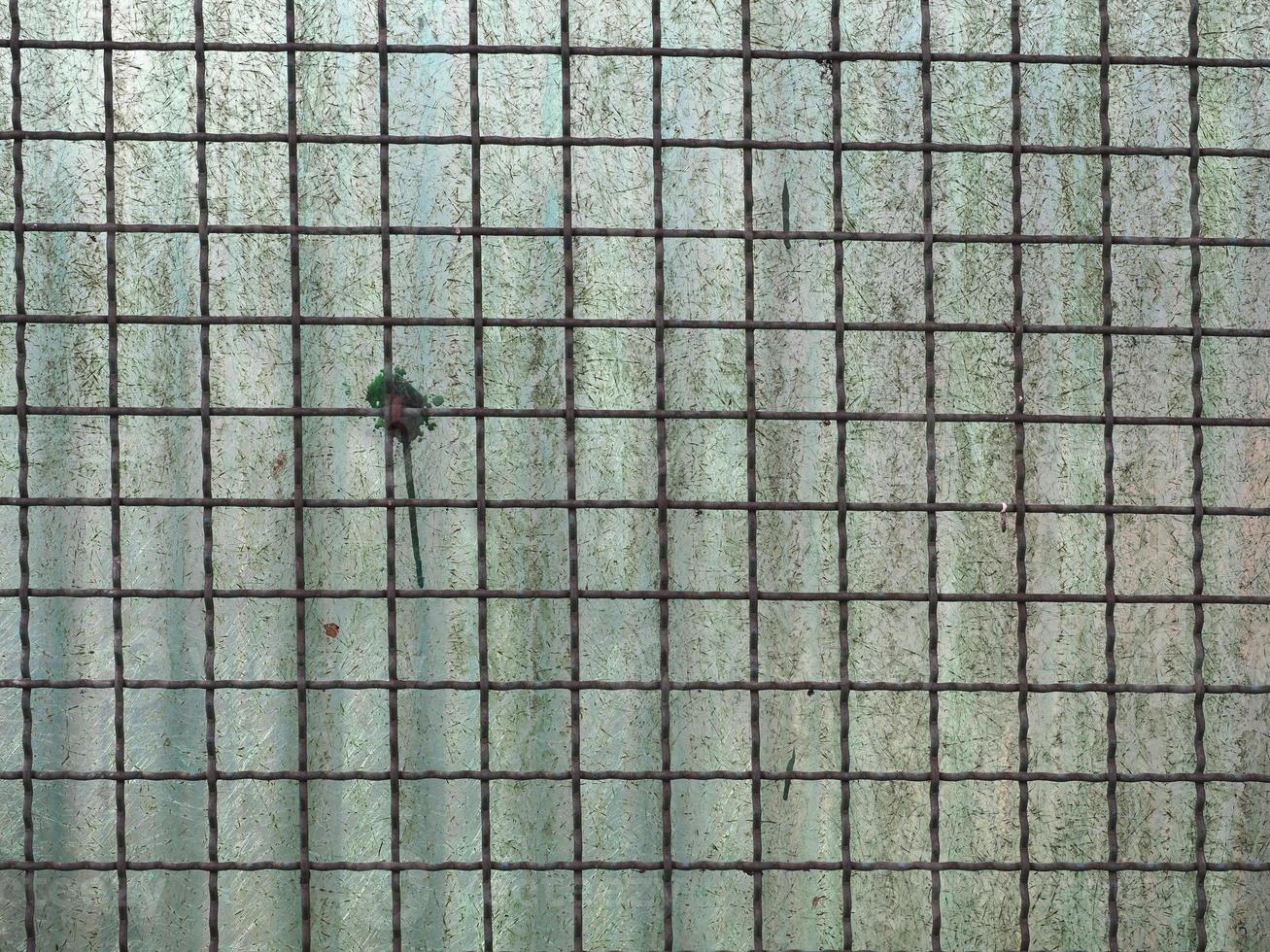 metal net and corrugated plastic fence background photo