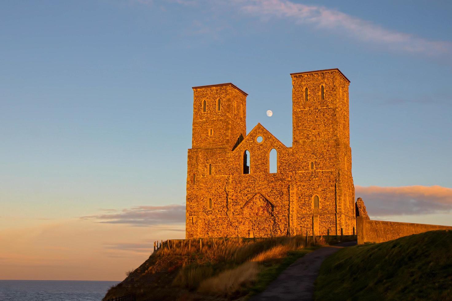 RECULVER, ENGLAND, UK, 2008. Remains of Reculver Church Towers Bathed in Late Afternoon Sun in Winter at Reculver in Kent on December 10, 2008 photo