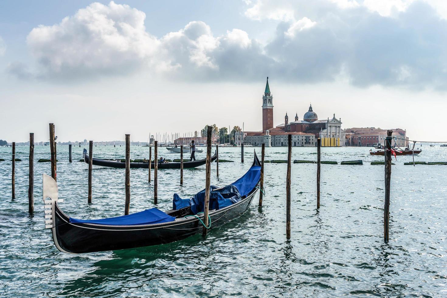 Gondola moored at the entrance to the Grand Canal photo