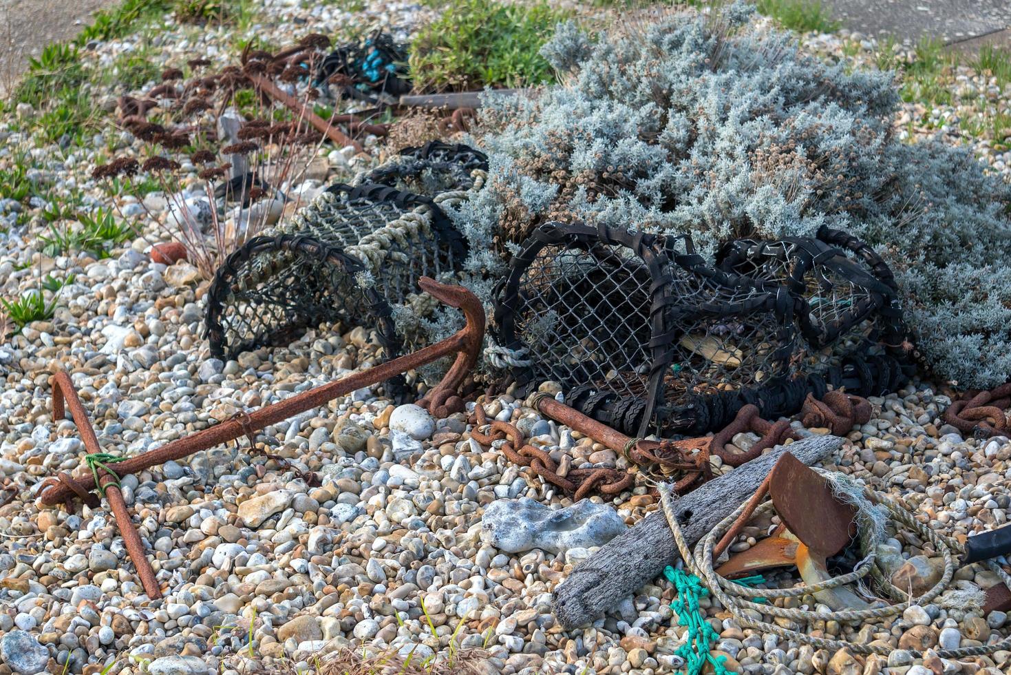 SELSEY BILL, WEST SUSSEX, UK, 2020. Lobster pots and anchor at Selsey Bill in West Sussex on January 28, 2020 photo