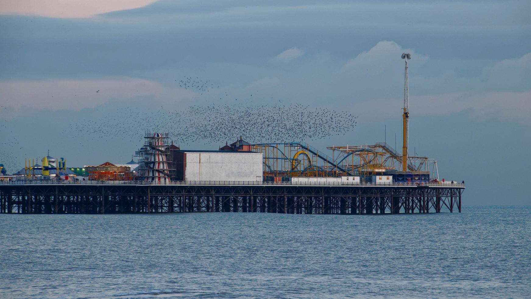 BRIGHTON, EAST SUSSEX, UK, 2018. Starlings over the Pier in Brighton East Sussex on January 26, 2018 photo