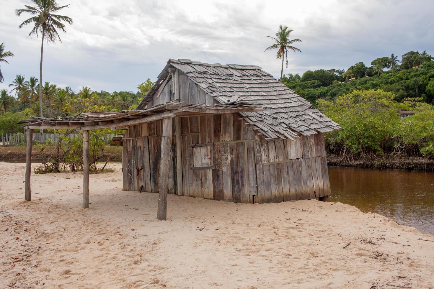 Trancoso Bahia, Brazil-March 9 2022 An Abandon old wooden Shack at the beach called Praia dos Nativos in Trancoso, Bahia, Brazil photo