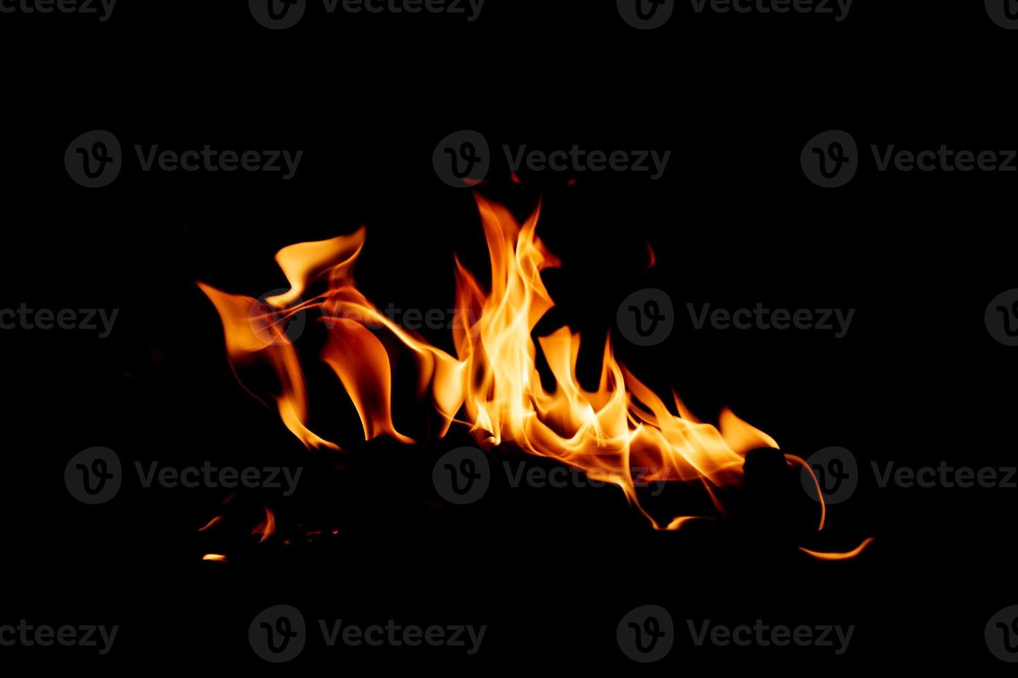 Fire flame texture. Burning material backdrop. Burn effect pattern. Blaze and torch wallpaper. Heat and haze backdrop. photo