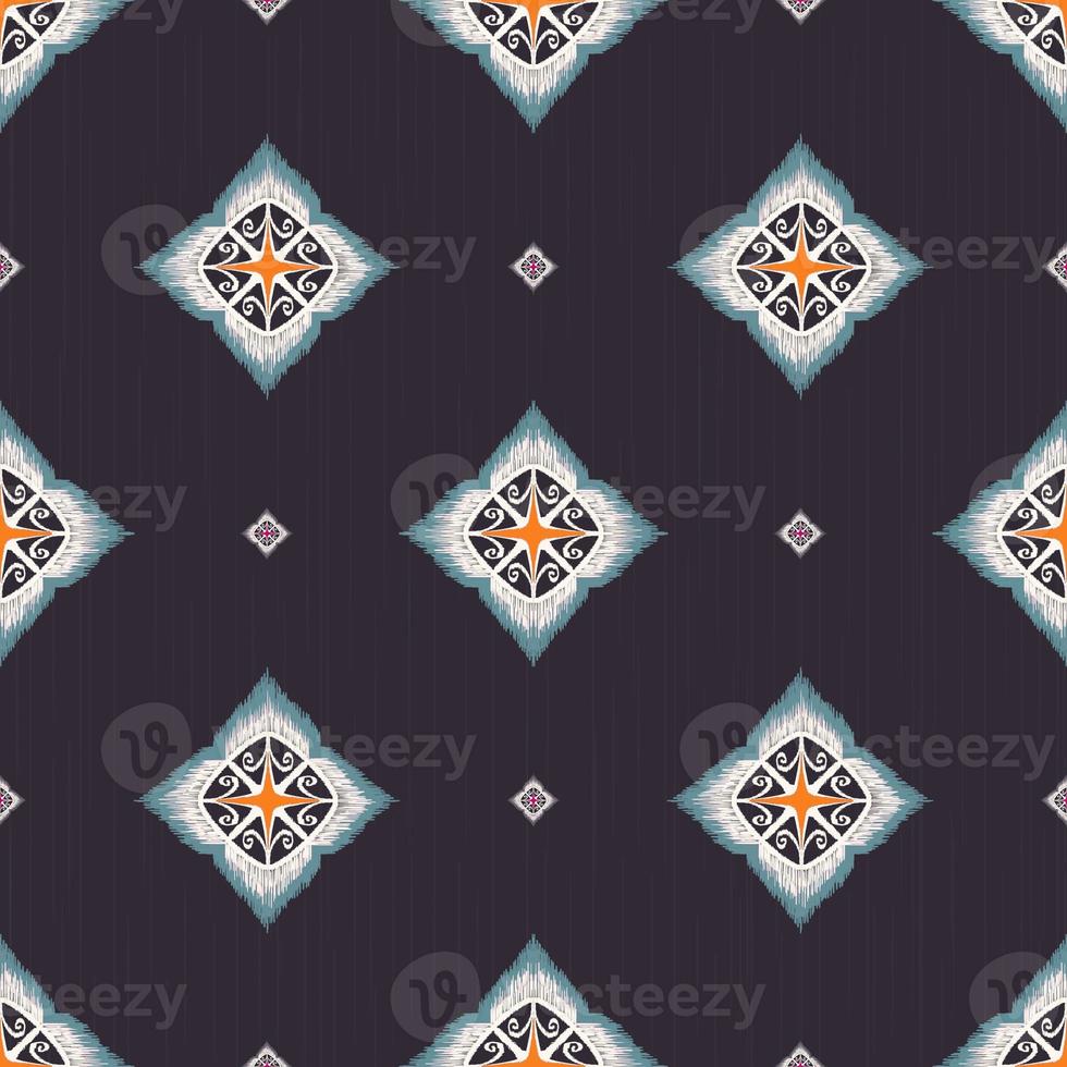 Colorful ikat ethnic tribal geometric flower shape seamless pattern on black background. Use for fabric, textile, interior decoration elements, upholstery, wrapping. photo