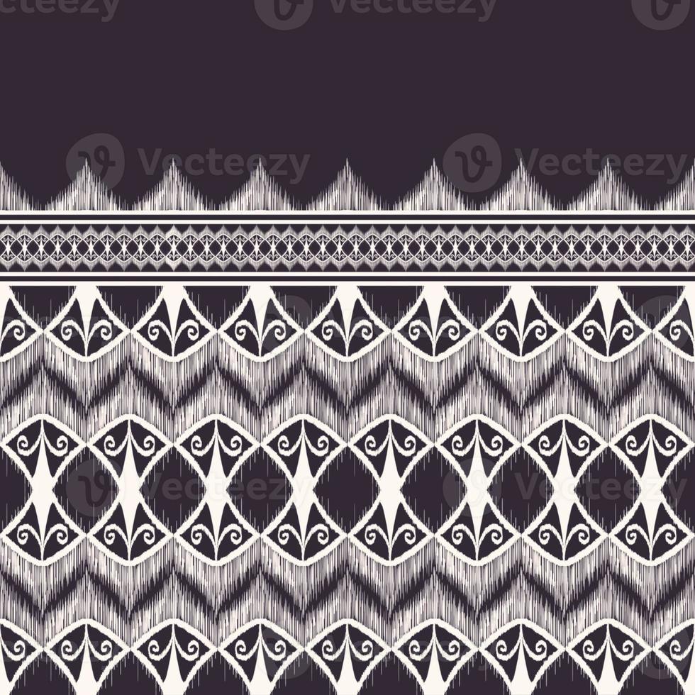 Traditional ikat ethnic tribal shape black and white color seamless pattern background. Use for fabric, textile, interior decoration elements, upholstery, wrapping. photo