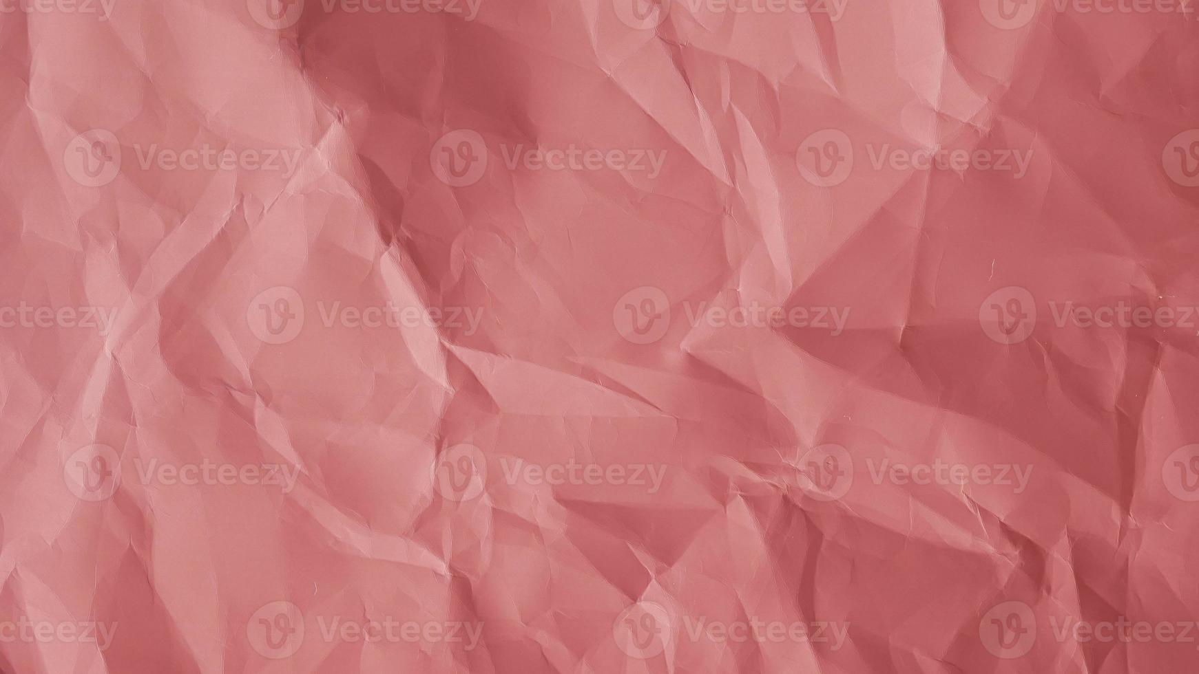 textura de papel arrugado rosa para fondo con espacio de copia para imagen o texto foto