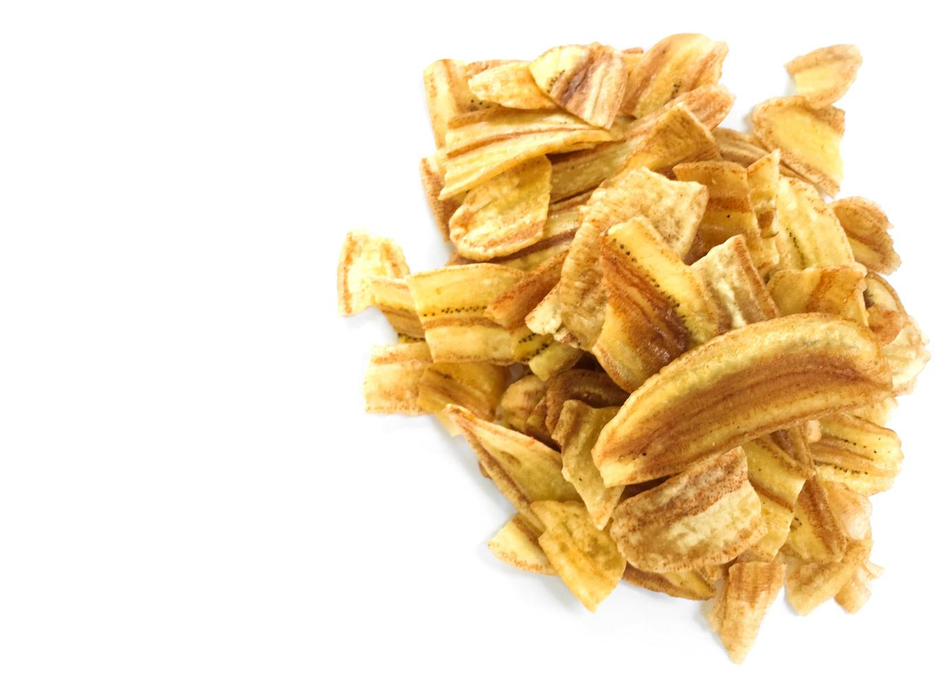 Asian caltivated banana or pisang awak banana cracker ro banana chips on white background, soft and selective focus. photo