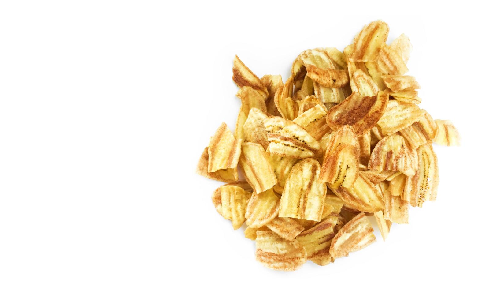 Asian caltivated banana or pisang awak banana cracker ro banana chips on white background, soft and selective focus. photo