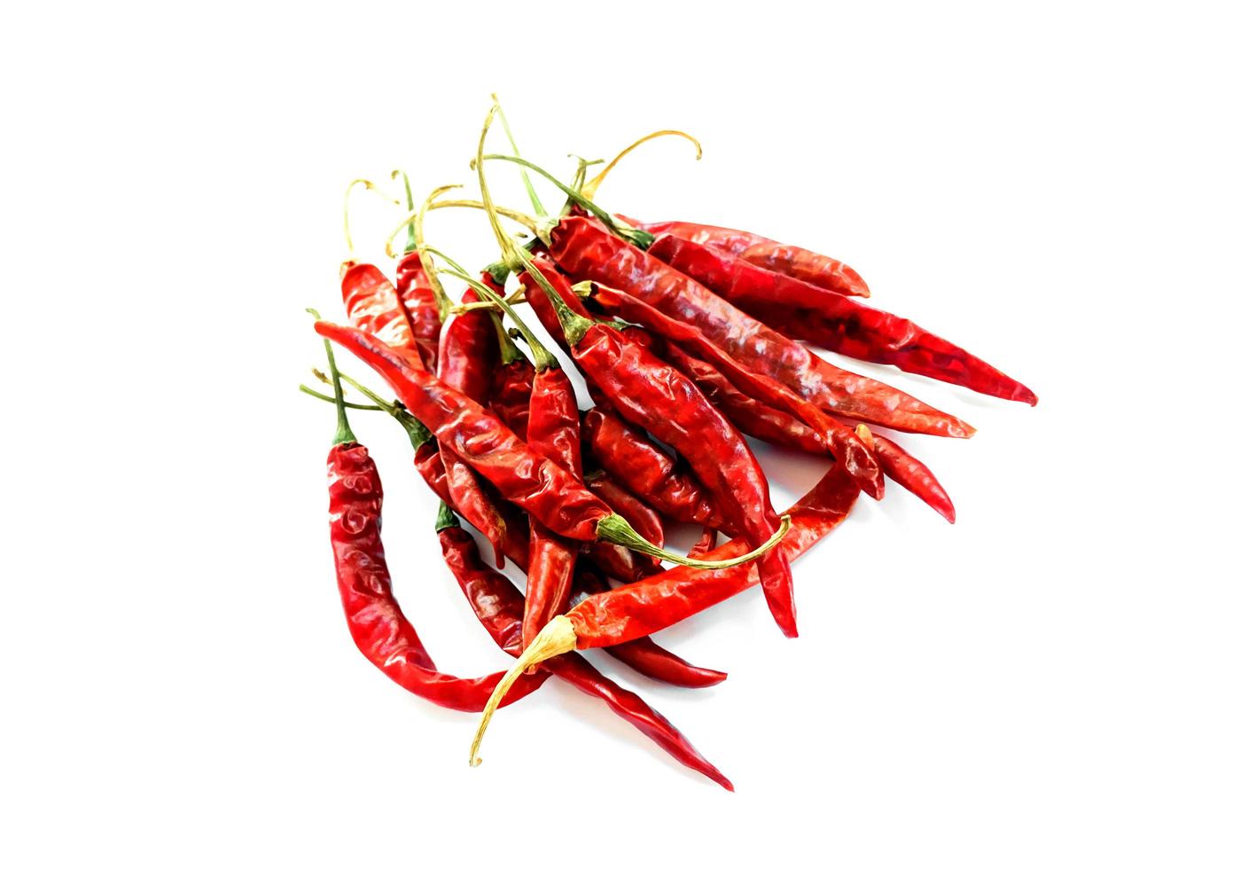 Dry red chillies on a white background photo