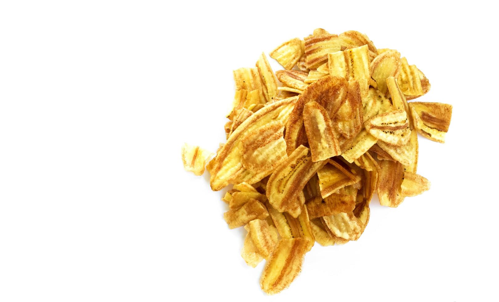 Asian caltivated banana or pisang awak banana cracker ro banana chips on white background, soft and selective focus. photo