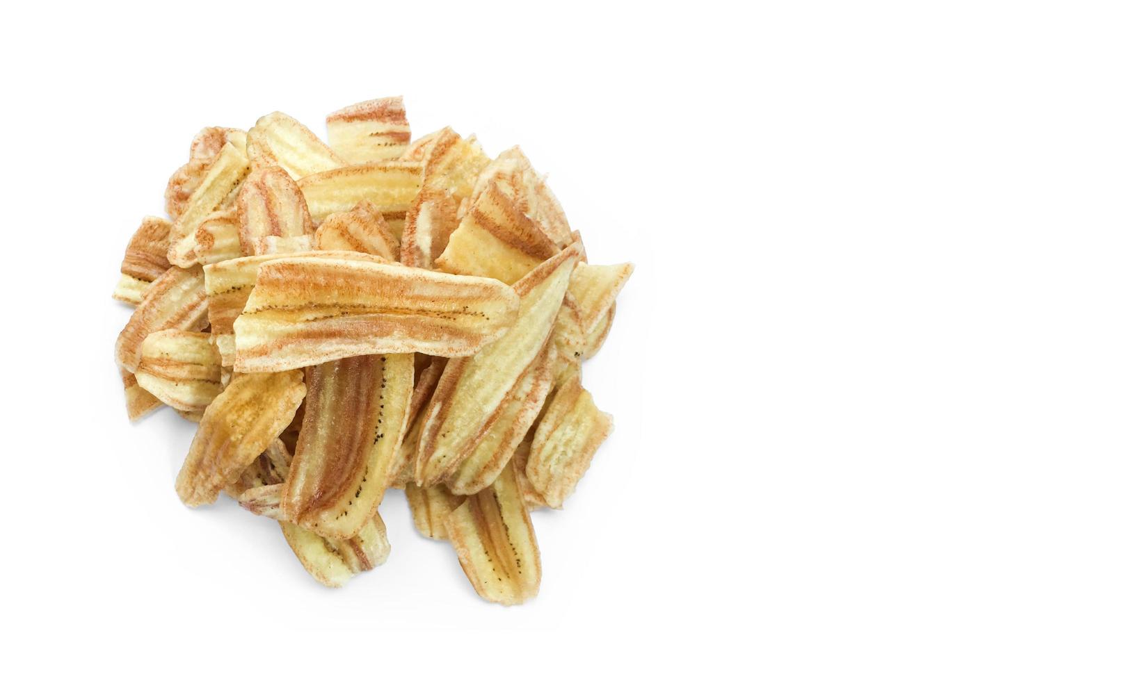 Asian caltivated banana or pisang awak banana cracker ro banana chips on white background, soft and selective focus. photo