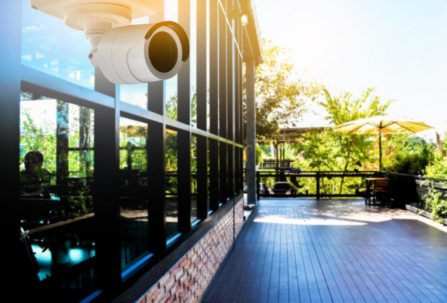 Mini cctv cameras installed on the wall outside the house to record and to do security at home when the house owner stayed outside, soft and selective focus on cctv cameras. photo