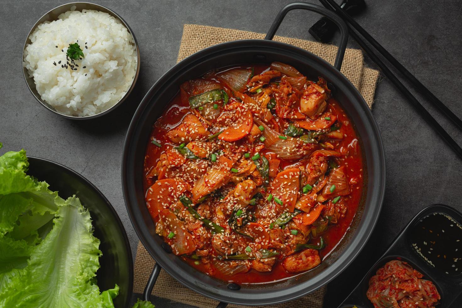 chicken fried in hot pot with spicy sauce in korean style photo