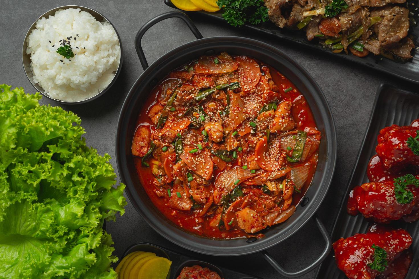 chicken fried in hot pot with spicy sauce in korean style photo