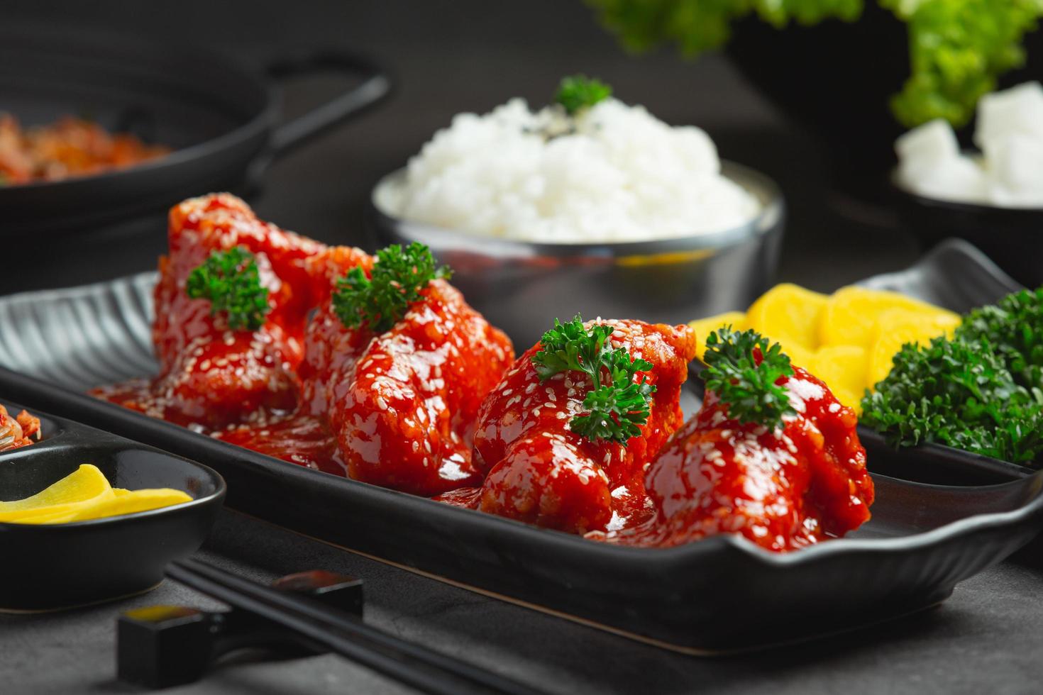 chicken fried in spicy sauce in korean style photo