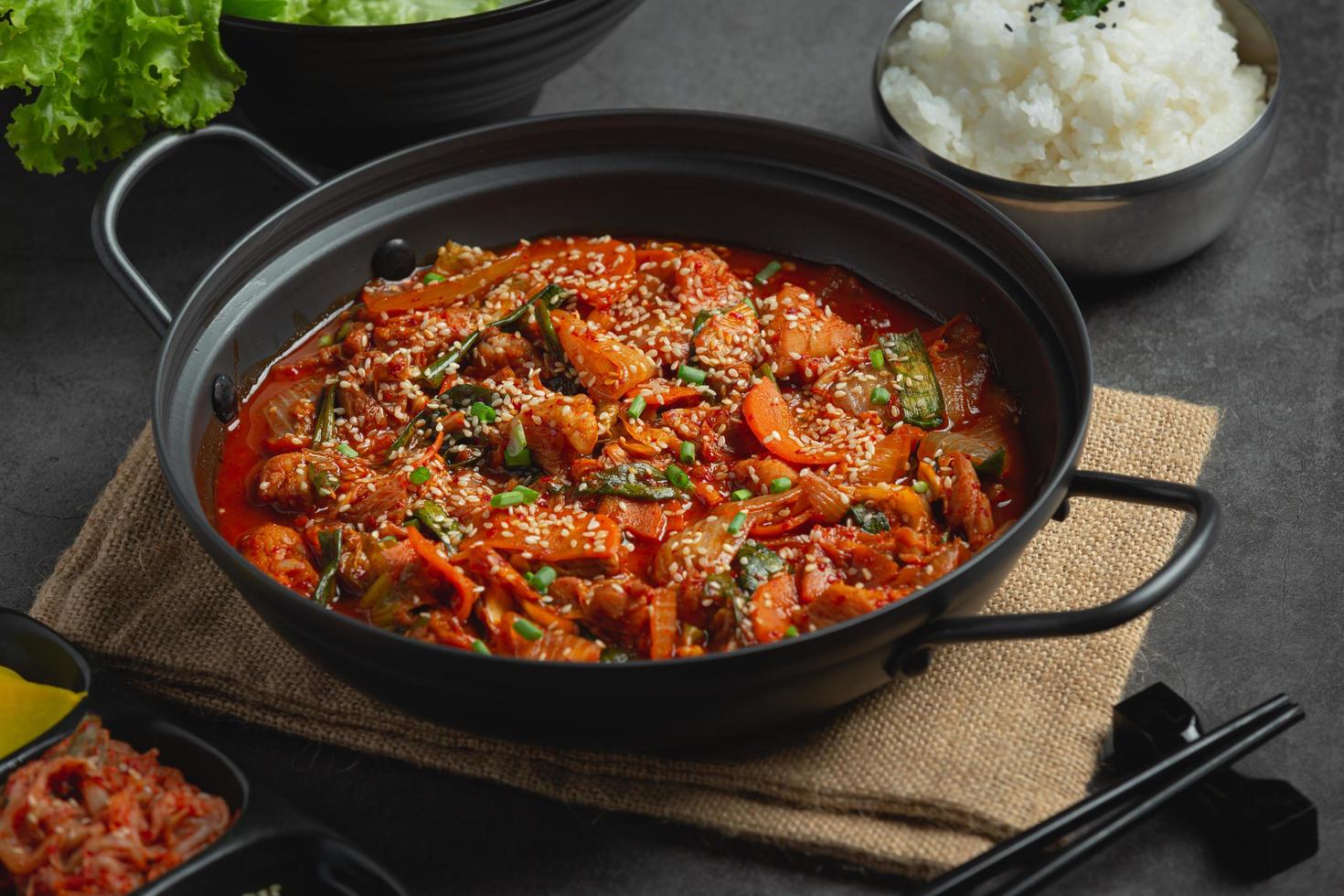 chicken fried in hot pot with spicy sauce in korean style photo