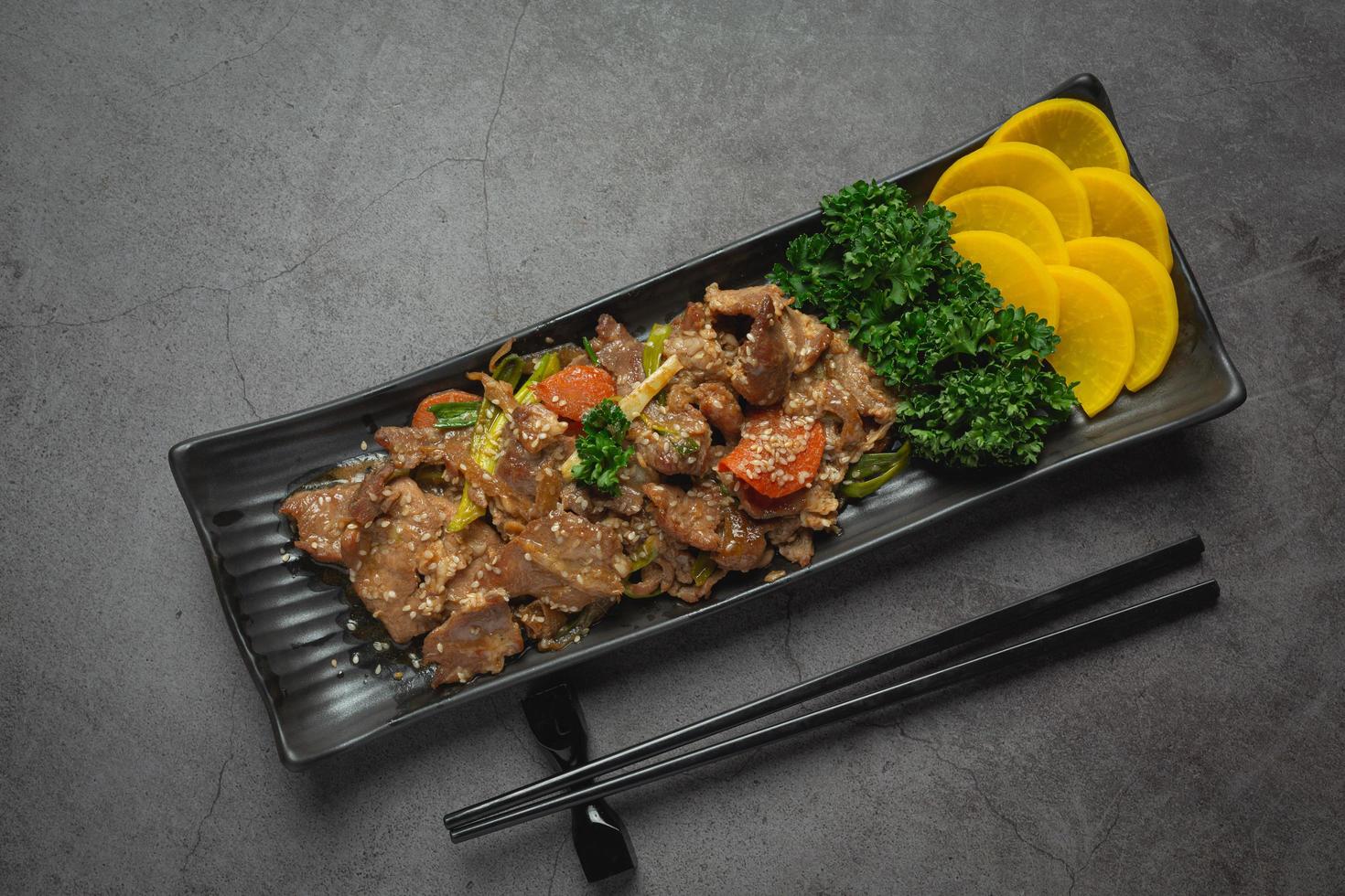 Korean food Bulgogi or marinated beef barbecue ready to serve photo