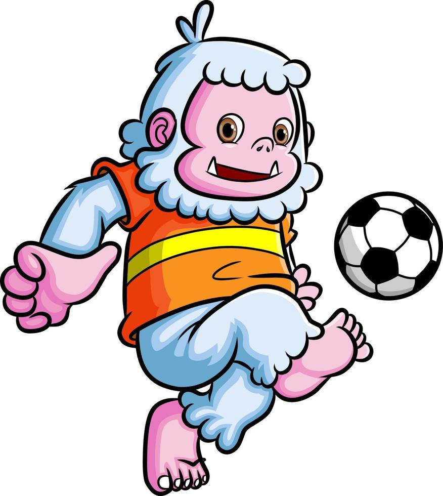 The sporty yeti playing the football and kicking the ball vector