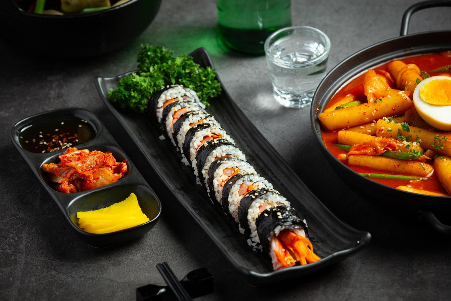 Korean food. Kim Bap - Steamed rice with vegetables in seaweed. photo
