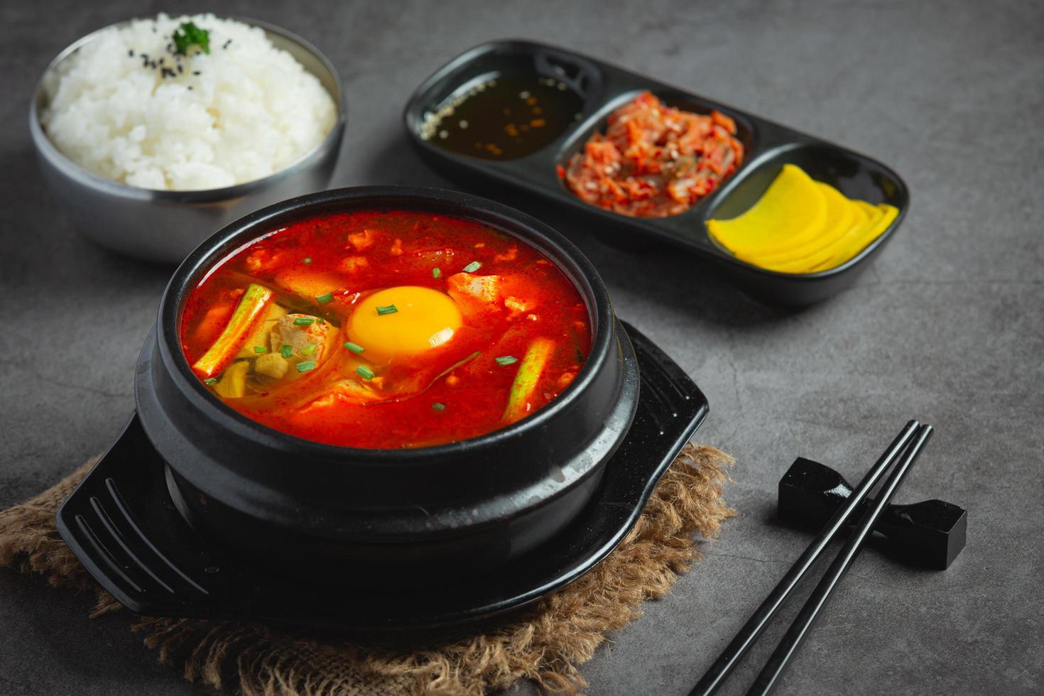 tofu and yolk boiled in spicy soup photo