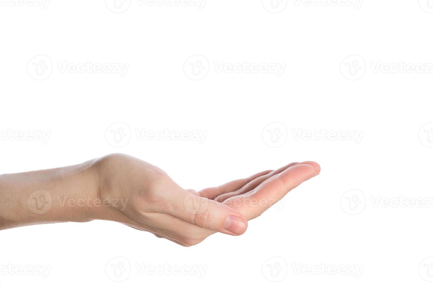 open empty woman palm isolated on a white background, begging gesture photo