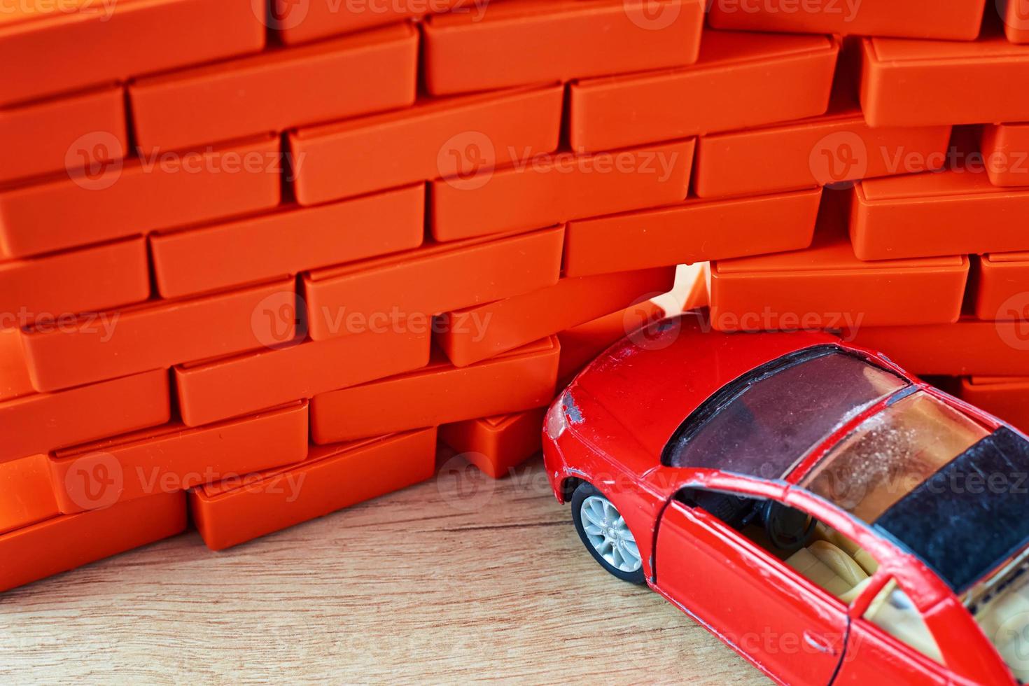 Car crash accident. Automobile hit a brick wall. A car insurance concept photo