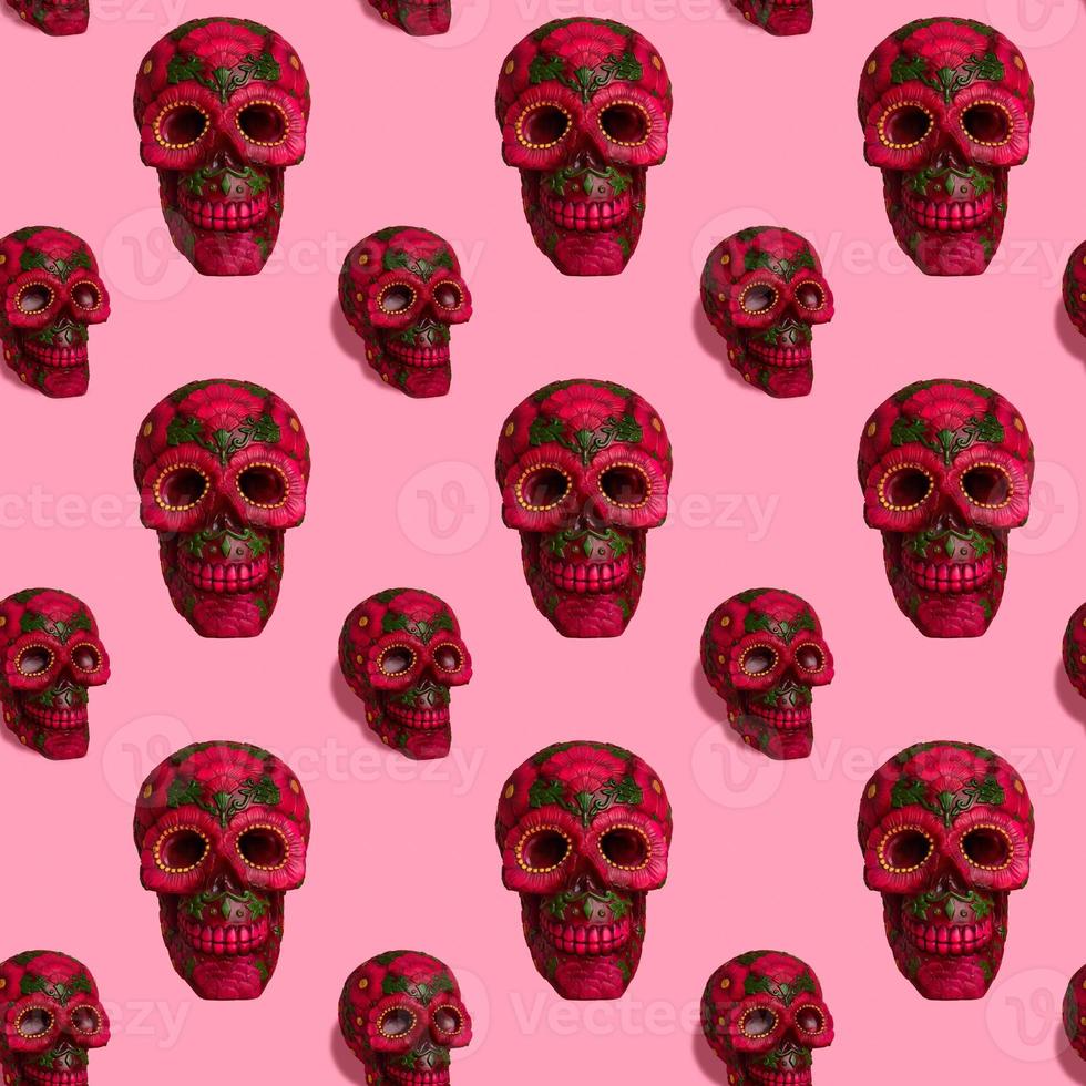 Square seamless background pattern from black skull with flowers. photo