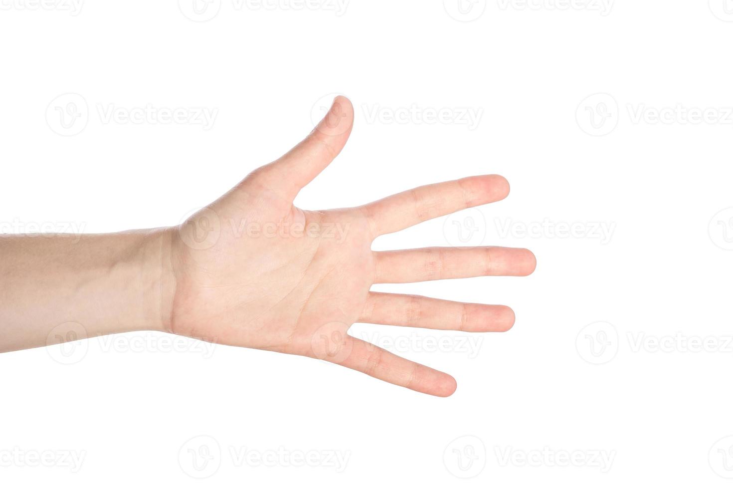 Woman hand shows numder five gesture isolated on a white background photo