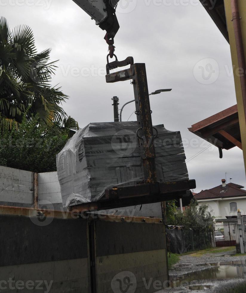 loading or unloading of stone tiles photo