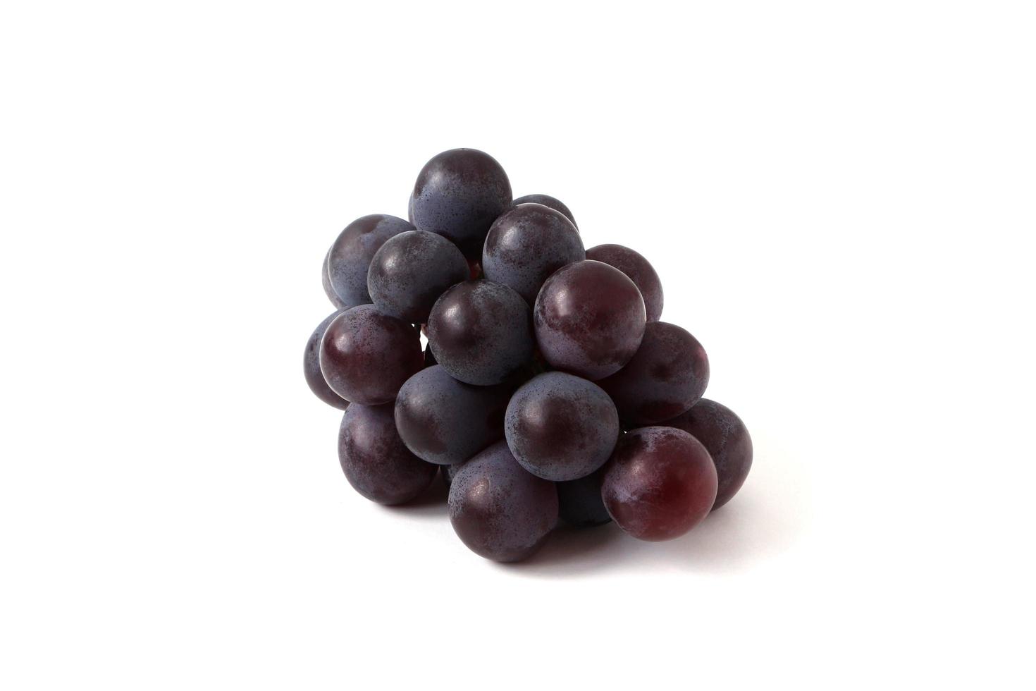 Blue grapes isolated on white background. photo