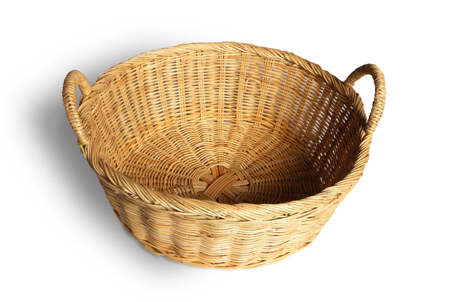 Empty Wicker basket on white background. photo