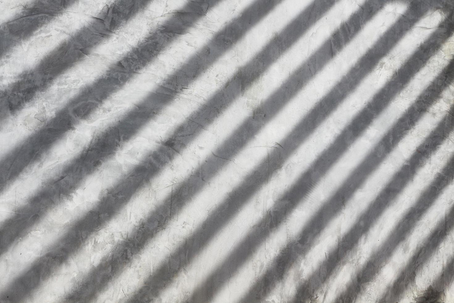 Abstract concrete wall with shadow pattern. photo