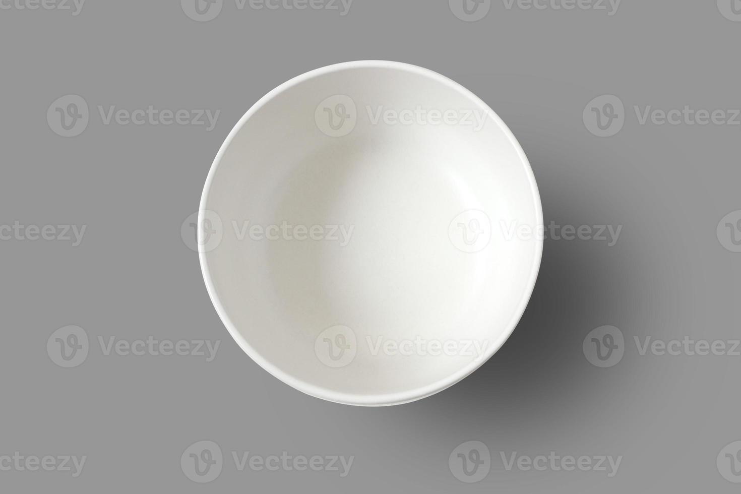 Empty bowl isolated on gray background with clipping path. Top view. photo