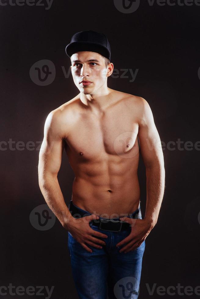 Portrait of a fitness man with nude torso photo