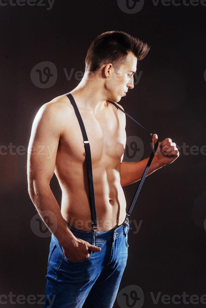 Portrait of a man with nude torso fitness photo