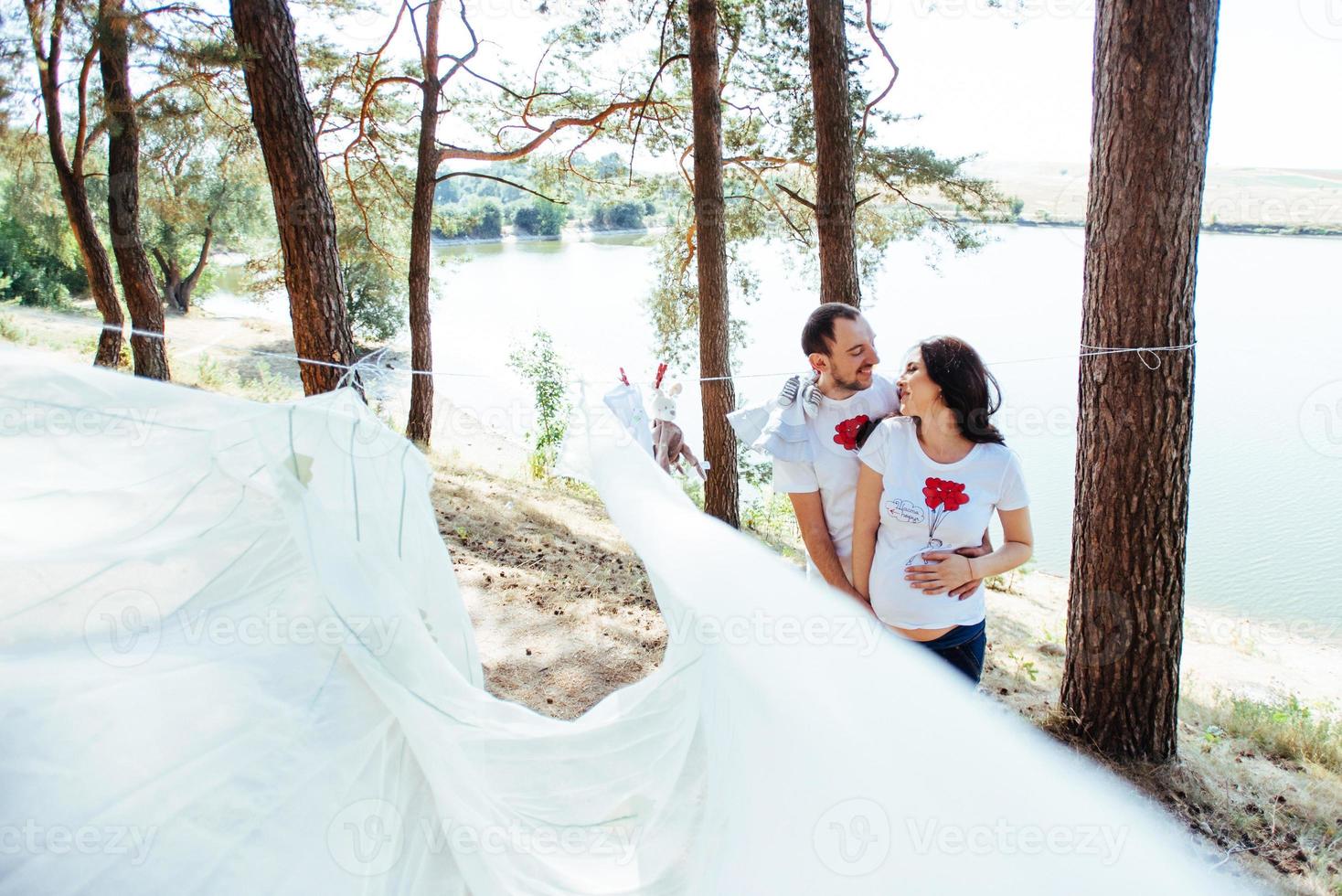 pregnant woman with her husband waiting for  newborn baby. photo