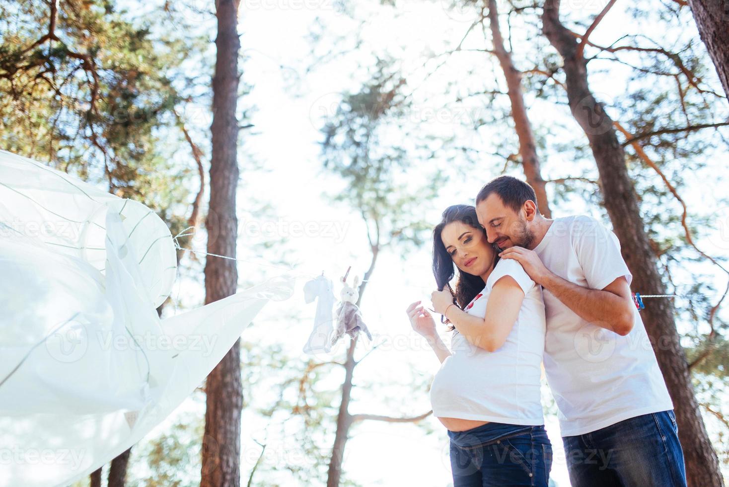 pregnant woman with her husband waiting for  newborn baby. photo