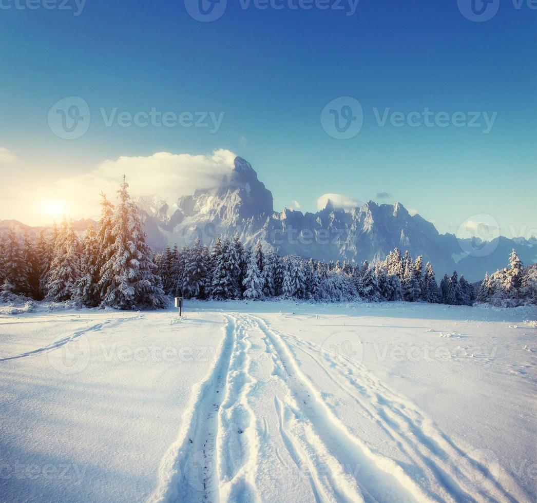 road mysterious winter landscape majestic mountains photo