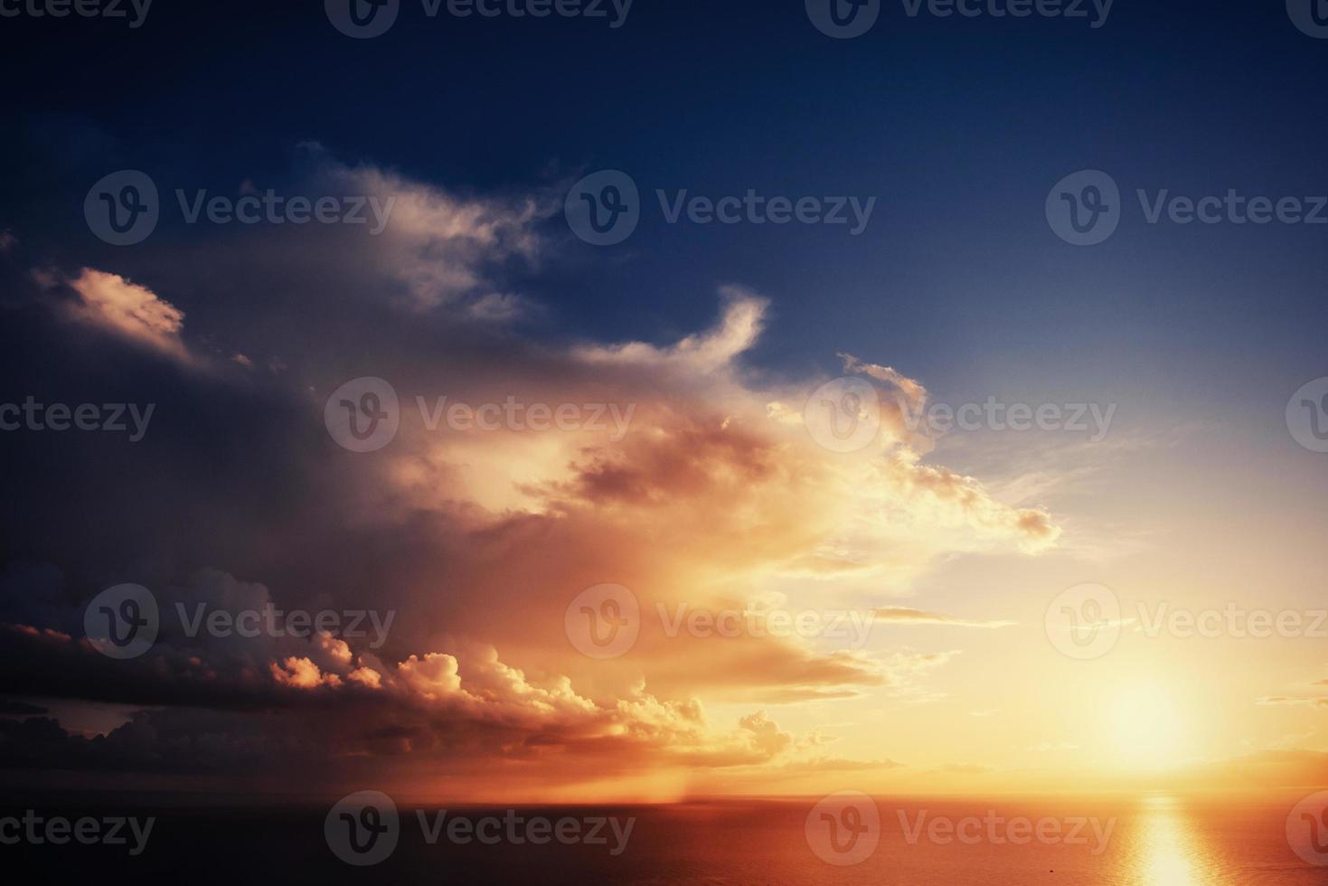 Sunset over sea photo