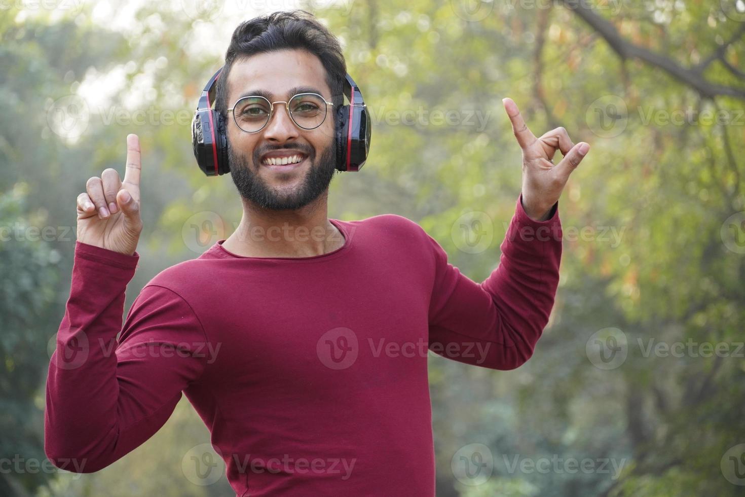 A young boy hearing the music photo