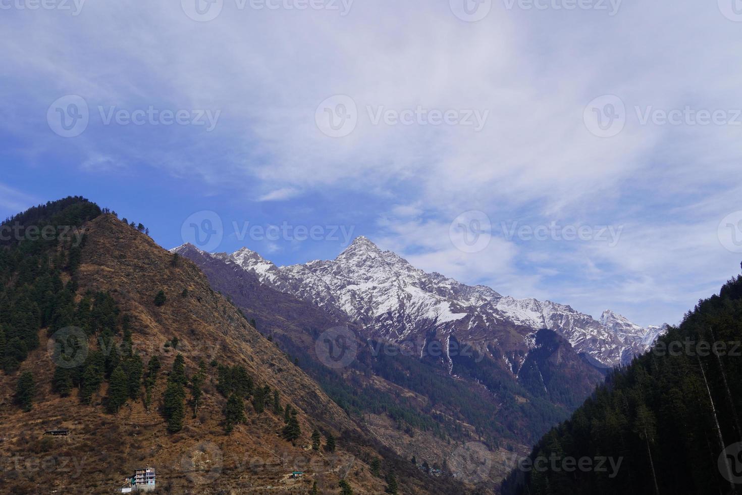 Close view of mountain with clouds photo