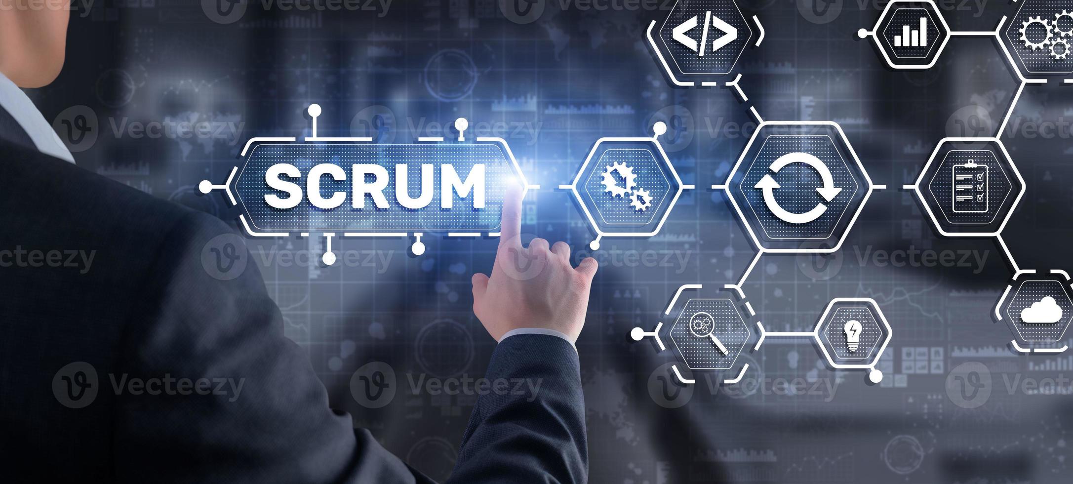 SCRUM. Hand presses the inscription scrum on a virtual panel. Agile development methodology photo