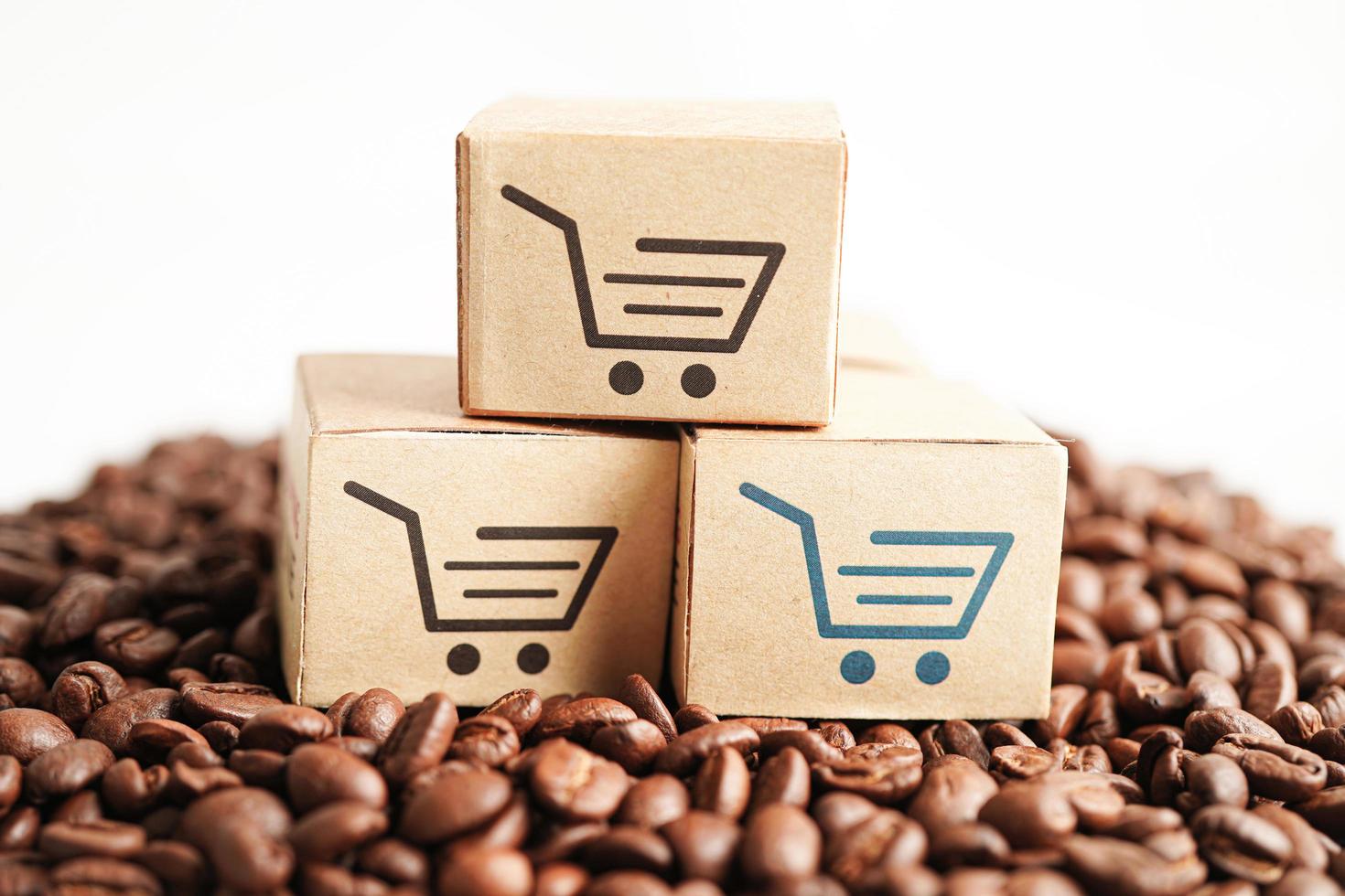 Shopping cart box on coffee beans, shopping online for export or import. photo