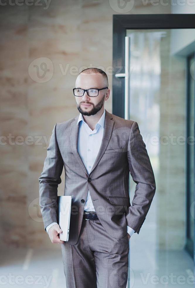 a successful man in glasses photo