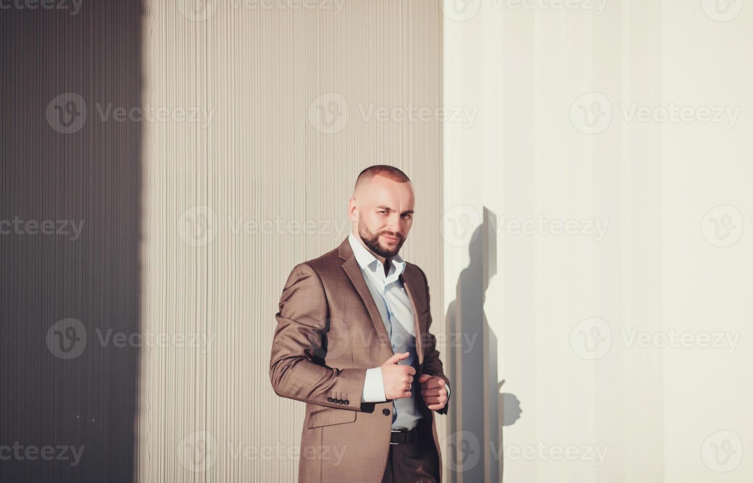 Stylish handsome man in suit photo