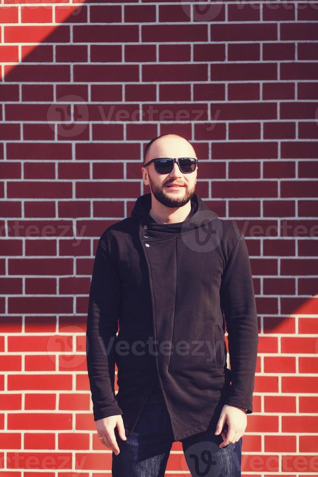 Smiling man in sunglasses photo