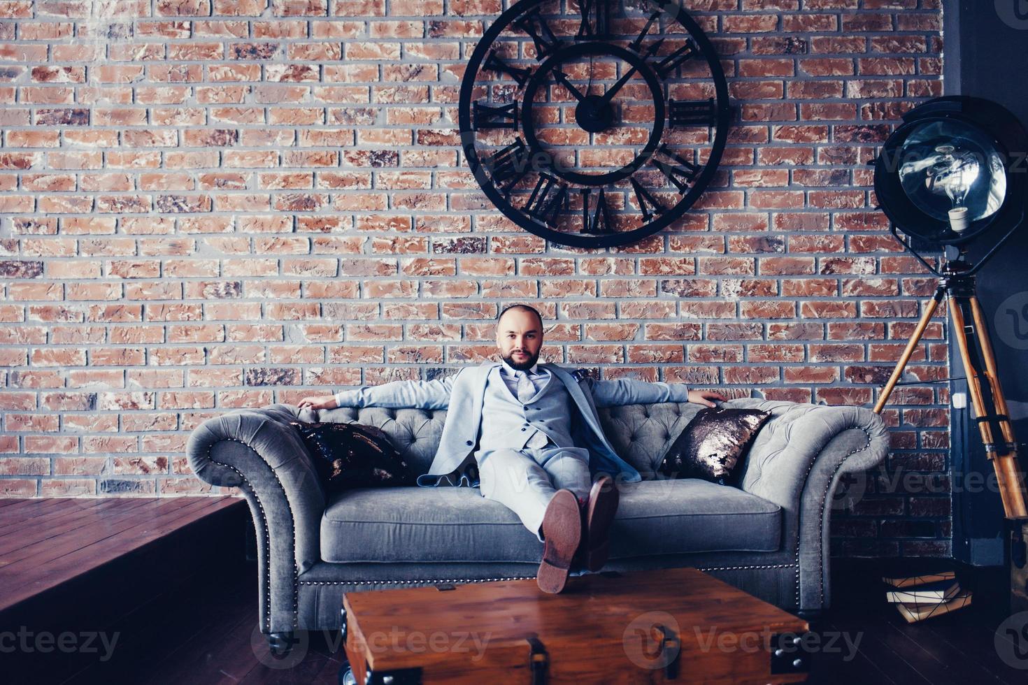 Young successful man in suit photo